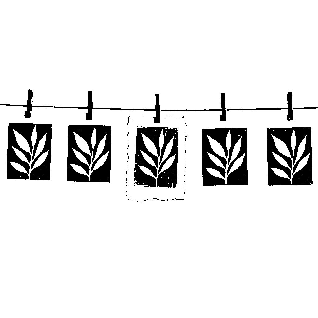 A row of identical printed sheets pinned to a line, with one rough hand-carved print among them.