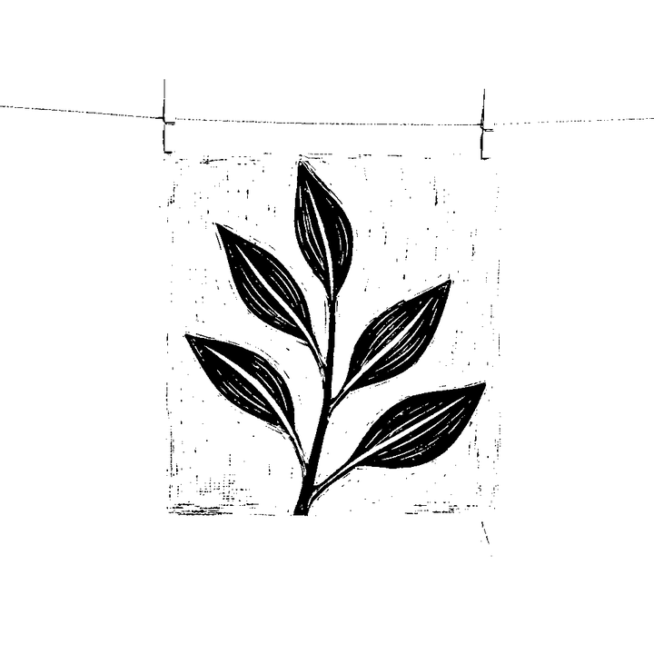 A print hanging to dry on a line, held by two pegs.